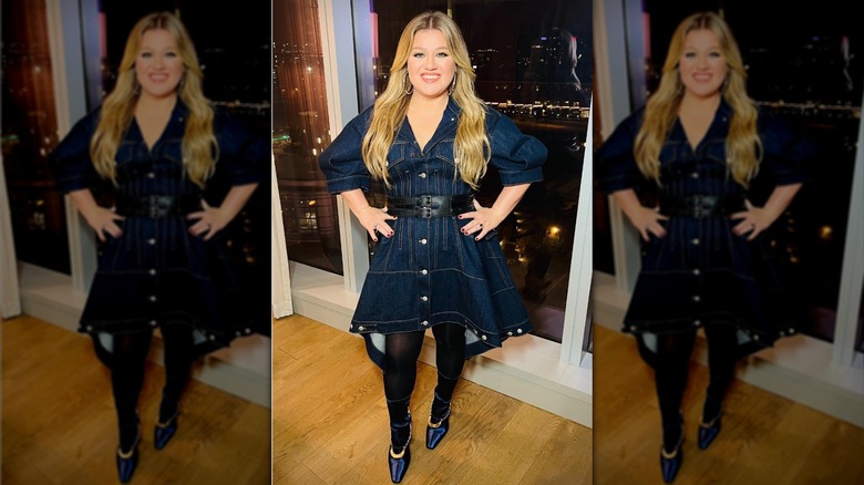 Kelly Clarkson wearing a denim dress and tights