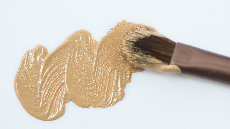 Cream foundation and brush