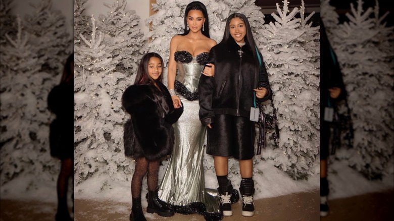 Kim Kardashian with her daughters