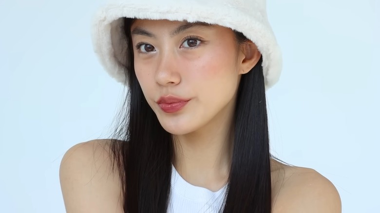 Woman wearing W blush