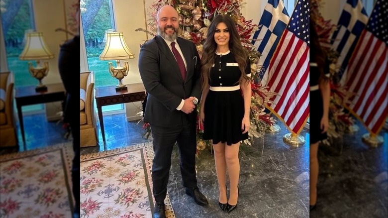 Kimberly Guilfoyle poses for a photo with Deputy Assistant Secretary for European & NATO Policy David Baker in Athens, Greece, in January 2026 (2026)