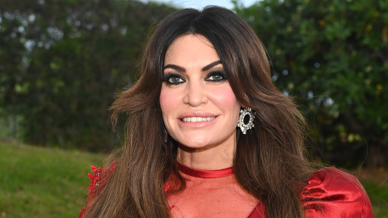 Kimberly Guilfoyle in a red dress at the amfAR Gala