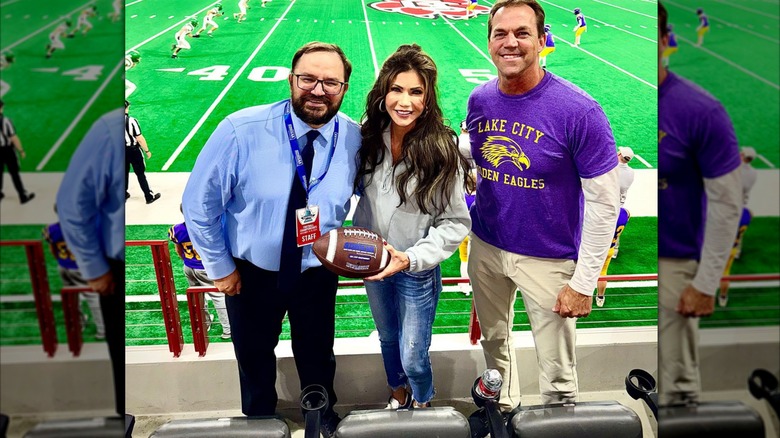 Kristi Noem at a football stadium