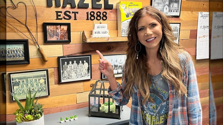 Kristi Noem wearing a plaid shirt