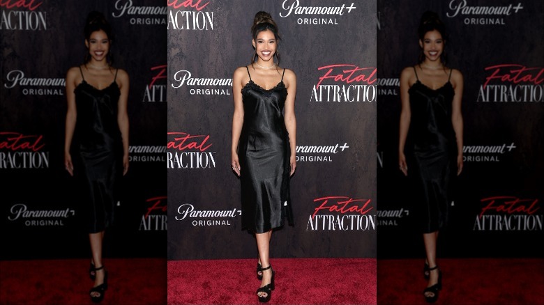 Kara Royster wearing black slip dress