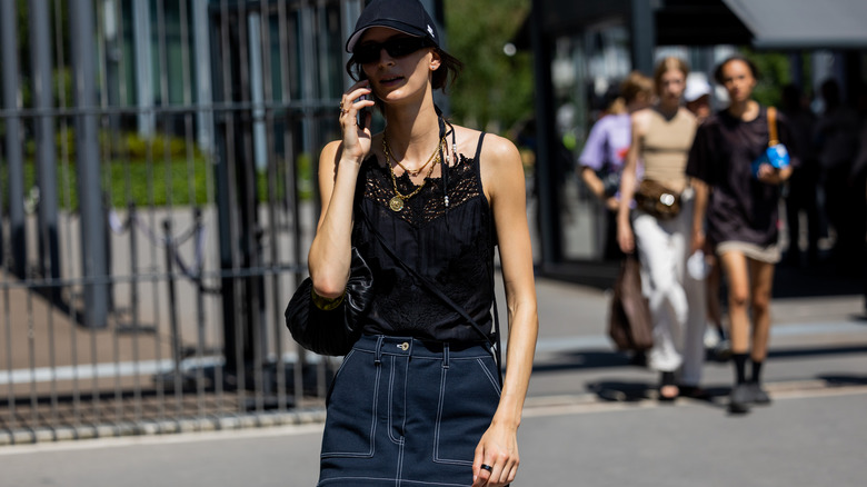 Woman wearing camisole with lace detail 