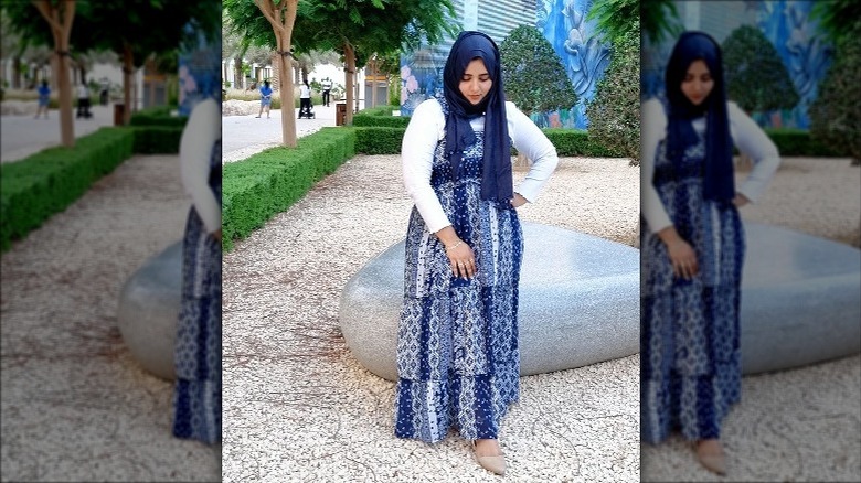 Woman wearing blue maxi dress