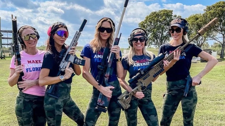 Lara Trump wearing a pro-MAGA outfit holding massive guns shorly after news of gun violence shook America
