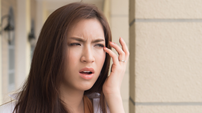 woman with an irritated eye