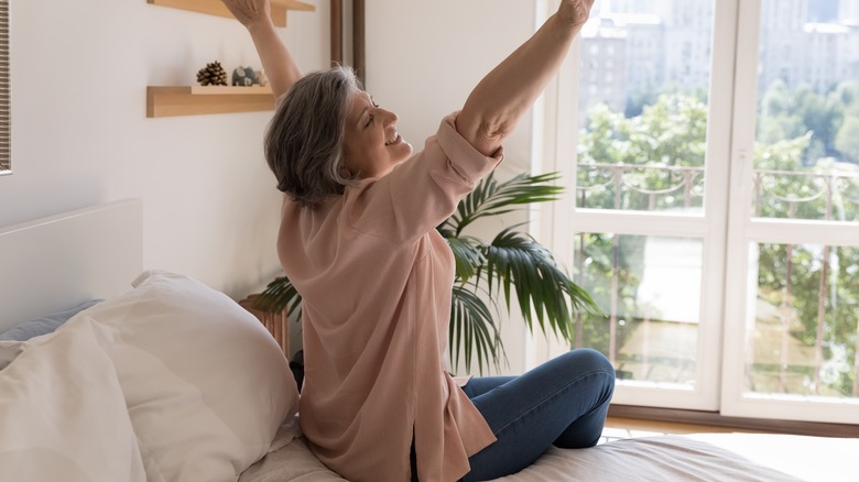 Woman swinging outside