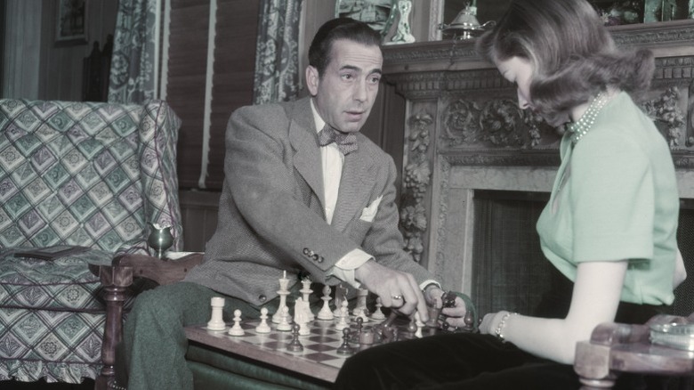 Humphrey Bogart and Lauren Bacall playing chess