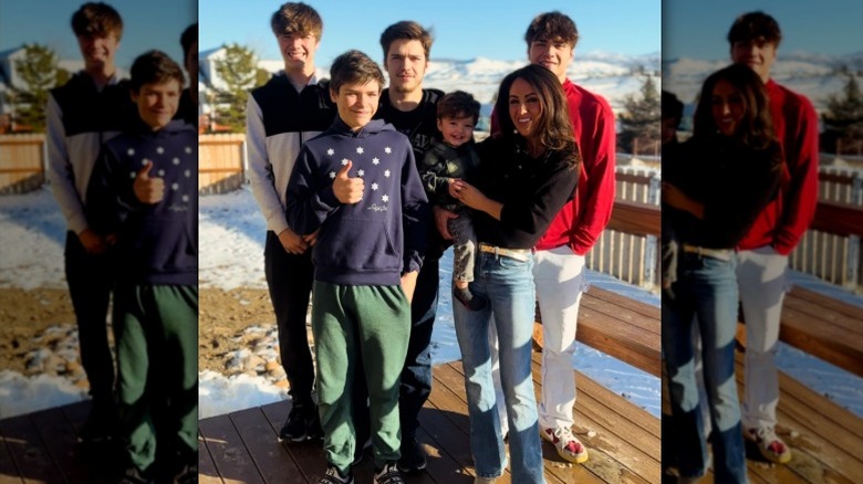 Lauren Boebert poses for a photo with her sons wearing bootcut jeans.