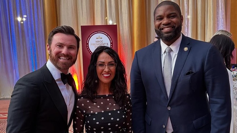 Lauren Boebert wearing a sheer form-fitting mini polka-dot dress to a GOP meeting