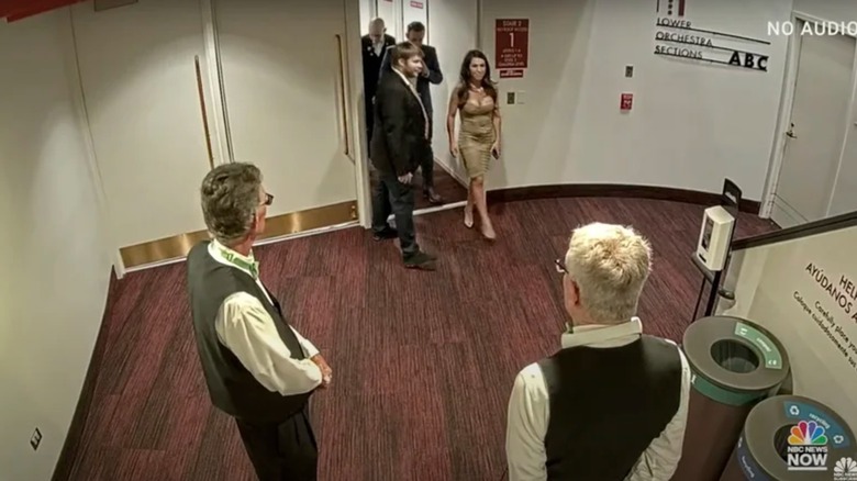 Lauren Boebert wearing a tight brown dress during a date night