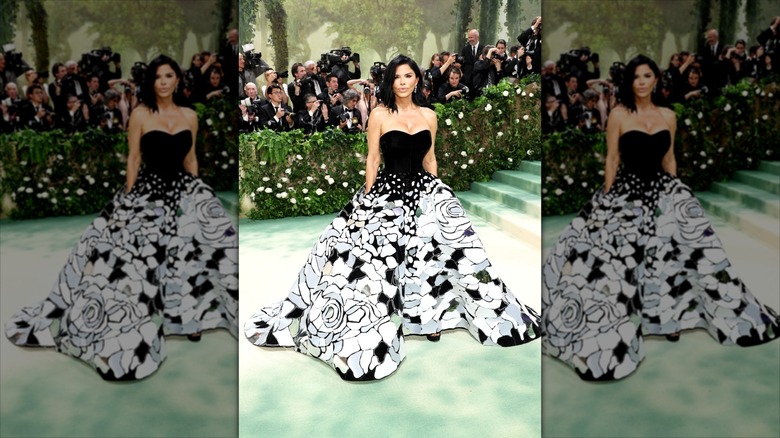 Lauren Sánchez Bezos poses wearing a ball gown at the Met Gala.