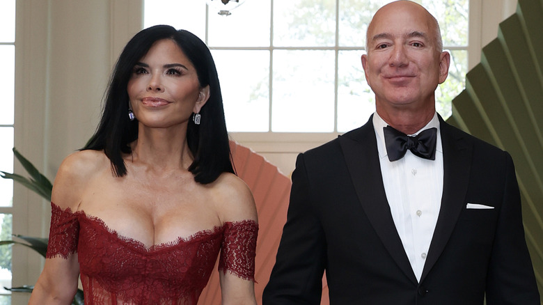 Lauren Sanchez Bezos and Jeff Bezos walking into the 2024 state dinner