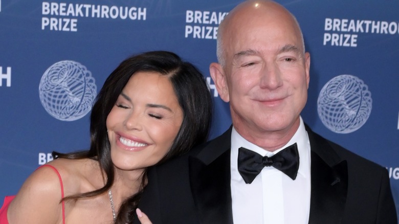 Jeff Bezos and Lauren Sanchez smile at the 11th Breakthrough Prize Awards at Barker Hangar in Santa Monica, California, on March 2, 2025 (2025)