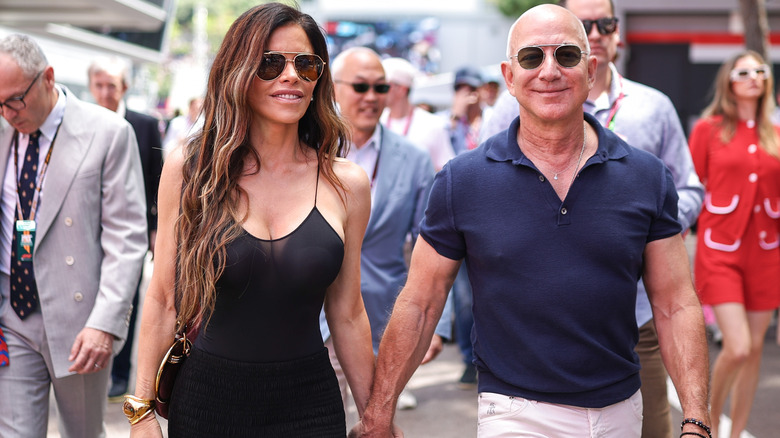 Lauren Sánchez wearing a little black dress with husband Jeff Bezos