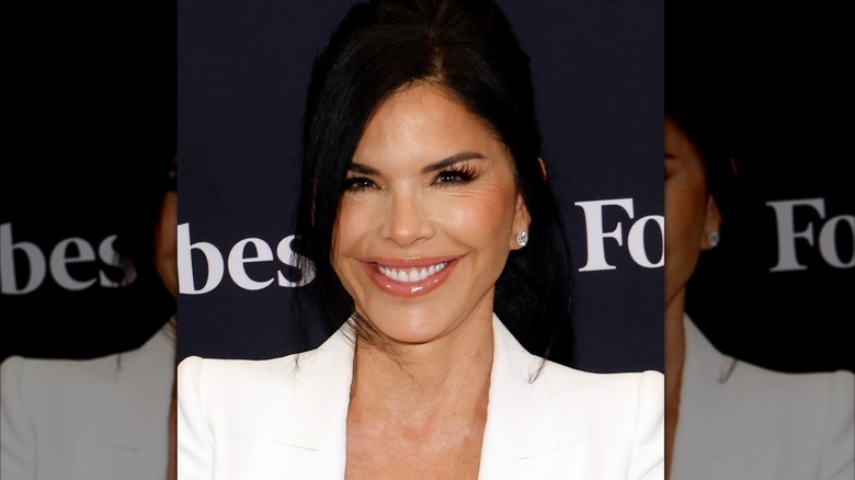 Lauren Sanchez in a white blazer smiling