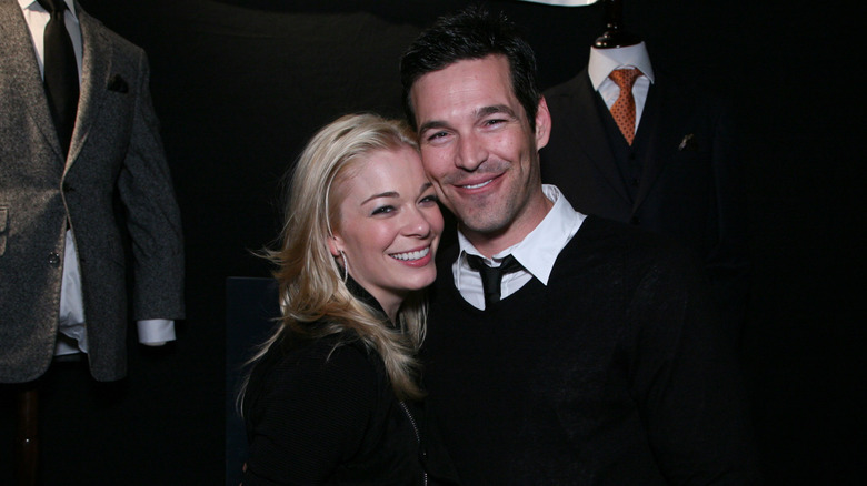 LeAnn Rimes and Eddie Cibrian cozy up next to each other