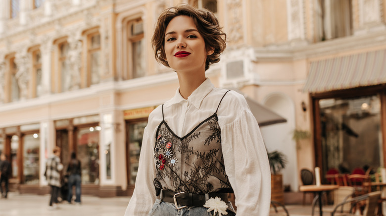 Woman in black lace top