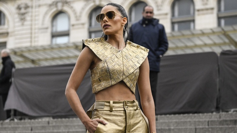 woman wearing leather crop topop
