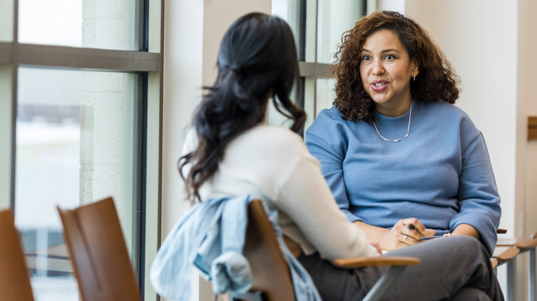 Woman meeting with her supervisor 