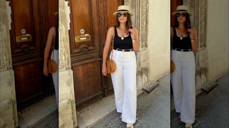 Woman wearing white pants 