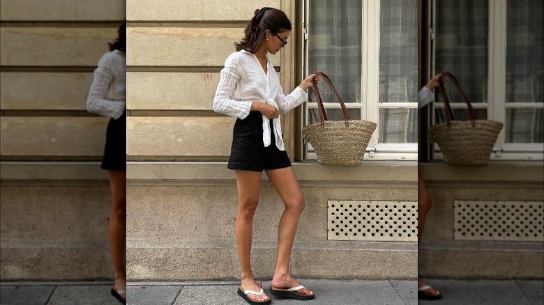 Girl with raffia bag.