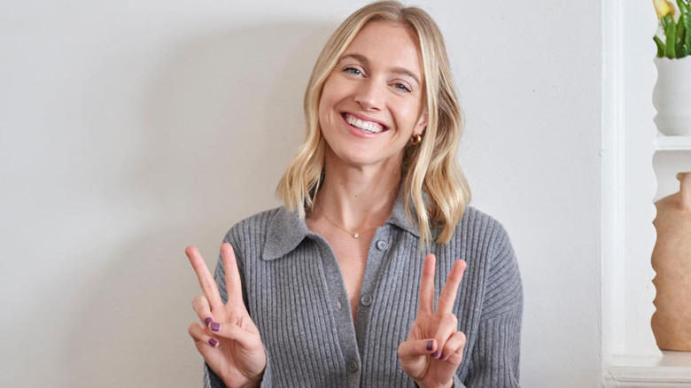 Olivia Bowser wearing a gray sweater