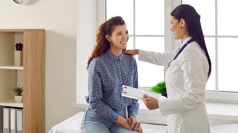 Patient with her doctor