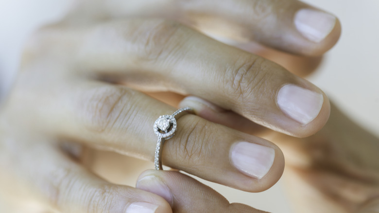 TikTok user @professionalnailss showing nail color theory for relationship status