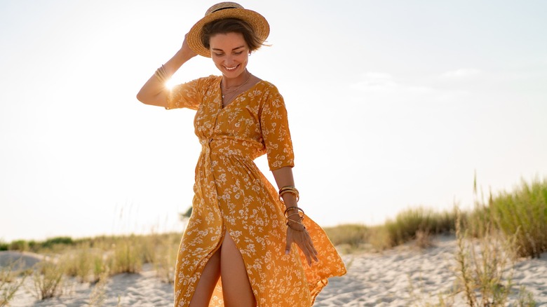 Woman in lightweight yellow dress