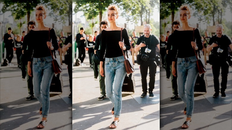 Model Maartje Verhoef wearing light-wash jeans