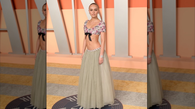 Lily-Rose Depp at the 2025 Vanity Fair party in a crop top and long skirt