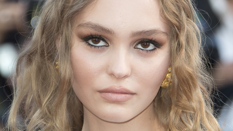 Lily-Rose Depp wearing a smokey eye and waterline eyeliner