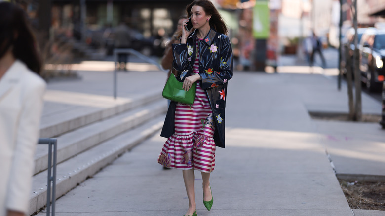 vinyl raincoat with floral appliques