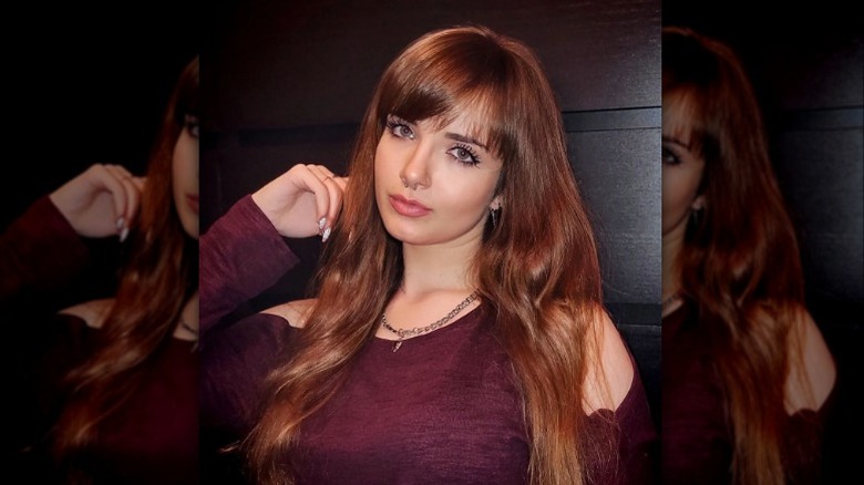 Woman with wispy bangs