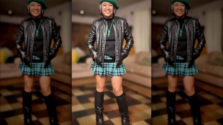person wearing green plaid mini skort