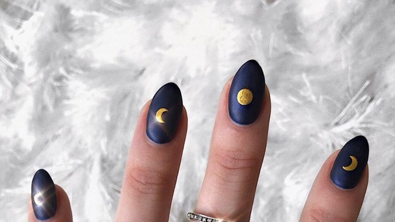 Blue manicure with gold