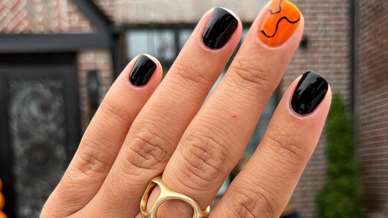 Black and orange manicure