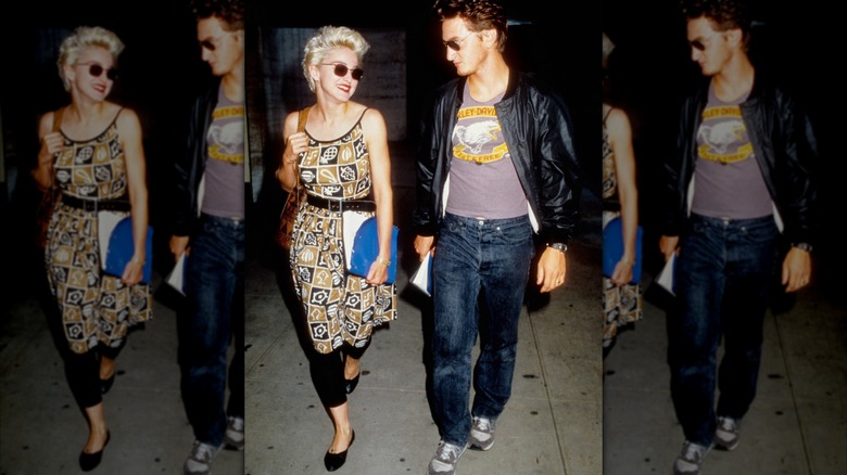 Madonna pictured with Sean Penn wearing a dress and leggings
