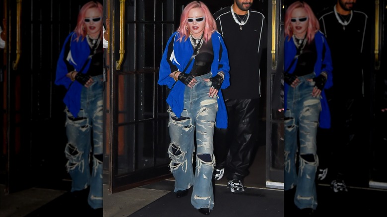 Madonna in 2022 with pink hair and sunglasses