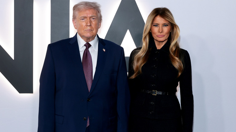 Melania Trump and Donald Trump posing