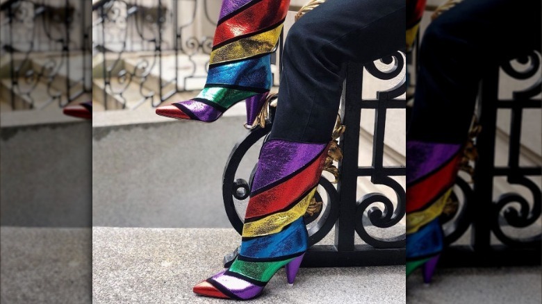 Rainbow leather boots worn by model