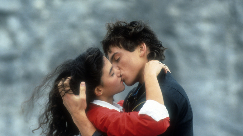 Jane Kaczmarek kissing Lewis Smith in a scene from the film 'The Heavenly Kid'