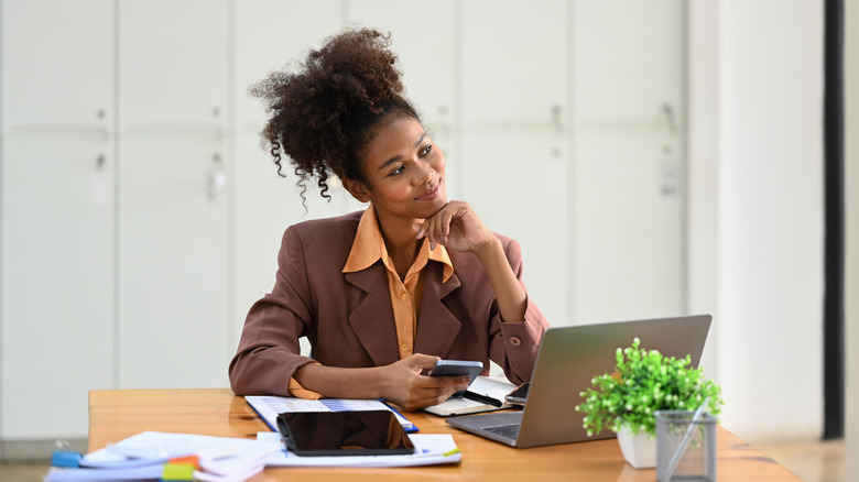woman thinking at work