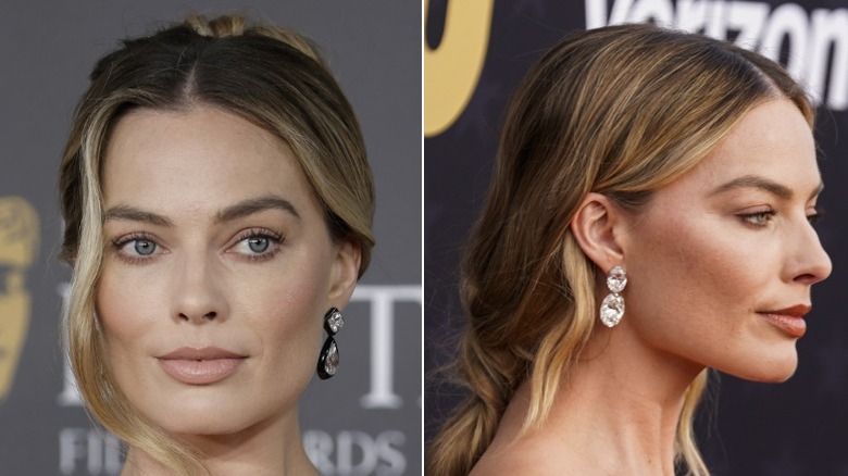 Margot Robbie with dark hair roots