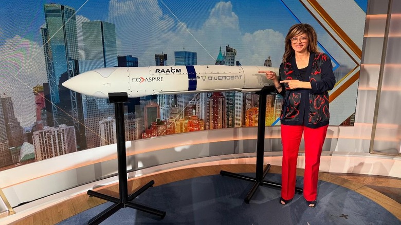 Maria Bartiromo wearing red pants