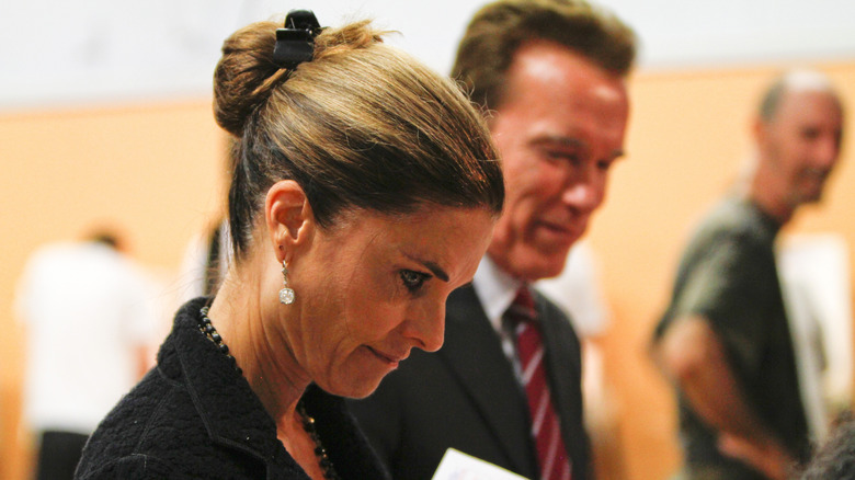 Arnold Schwarzenegger and Maria Shriver voting